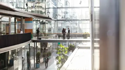 Office building fromthe inside with people talking