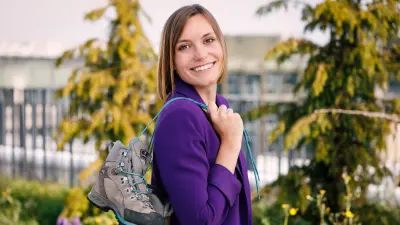 Miriam Klein, Team Lead Service & Portfolio Management for Energy Data Services at Bosch Energy and Building Solutions Portrait with hiking boots