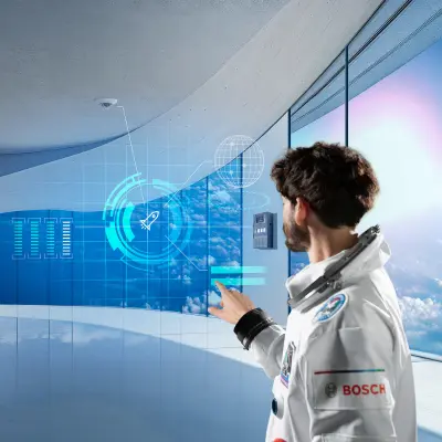 Ein moderner Raum mit einem Brandmelder und einer Brandmeldezentrale. Ein Datanaut mit einem virtuellen digitalen Dashboard symbolisiert den digitalen Brandschutz.