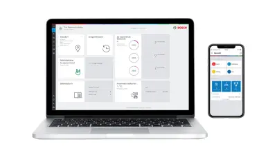 Laptop und Mobiltelefon zeigen ein Brandschutz-Dashboard