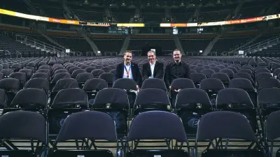 Interior photo of the Arena with Bosch and Arena employees