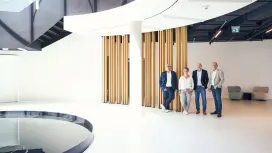 Representatives of Babor and Bosch stand in the lobby of the Babor Beauty Cluster, interior view