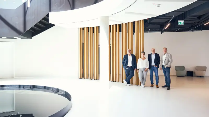 Representatives of Babor and Bosch stand in the lobby of the Babor Beauty Cluster, interior view