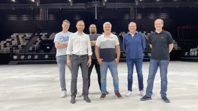 Bosch employees involved in the implementation of the sound reinforcement technology at the Kia Metropol Arena 