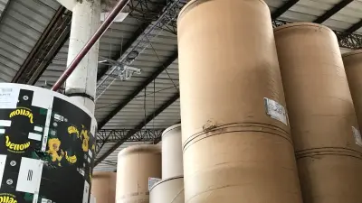 AVIOTEC cameras mounted on the ceiling in warehouse of paper factory