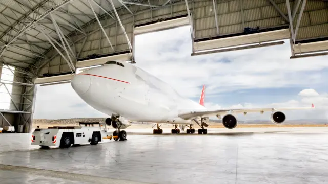 Airplane enters hangar