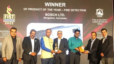 Award ceremony - six honorable Indian businessmen standing on stage receiving the FIST award.