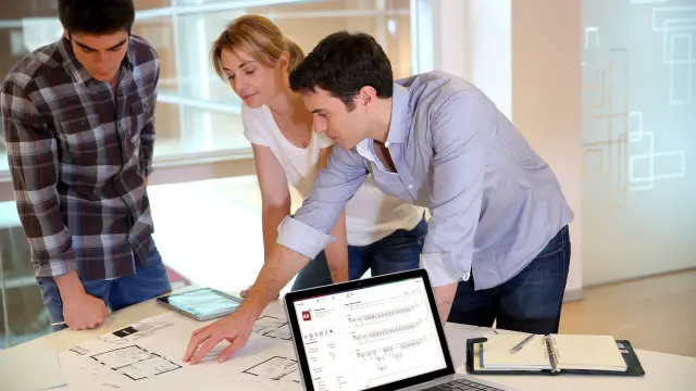 Three architects planning a project